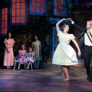 Gregory J Trapp Jr. (Kurt), Taylor Quick (Liesl), Lily Philbrook (Marta), Josie Marzilli (Gretl), and Sophia Scott (Louisa) watch as Hanley Smith (Maria), Will Ray (Captain Von Trapp) demonstrate an Austrian folk dance in a scene from MSMT’s “The Sound of Music” playing through June 25. Jared Morneau Photography