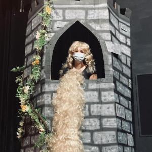Rapunzel (Sofia Michaud) is patiently waiting in her tower for your arrival at the Lincoln Theater!