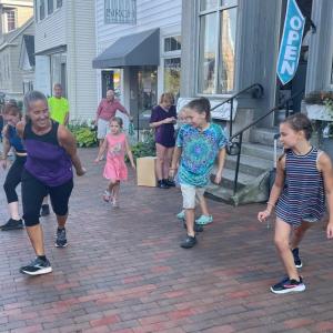 Dancemaineia dancers share a few moves with young visitors at Wiscasset Art Walk Aug. 25. Wiscasset Art Walk photo