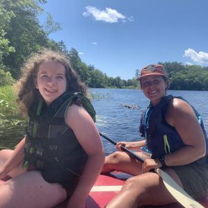 Camper Chloe Joneth of Boothbay and Deputy Director Jess Donohoe on Knickerbocker Lake. Courtesy of Hearty Roots