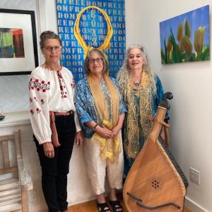 Grouped under Sochor’s canvas “Freedom,” Singers at Mathias Fine Art Aug 20 for a special program are: Lesia Sochor, soprano Anna Dembska, and Trevett’s Andrea Goodman. Courtesy of Cordula Mathias