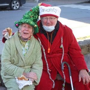 Howard and Dee Wright are always game for getting into the spirit of things. Here they are at last year’s Early Bird Sale. File photo