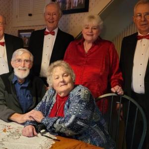 Dapper Barbershop Quartet members with Carol Kimball of Jefferson after delivering a singing valentine. Courtesy of Lew Flagg