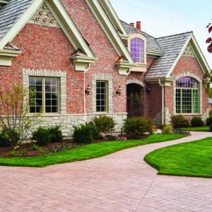 Upgrading a driveway and walkway is one way to update a home’s exterior and restore its curb appeal.