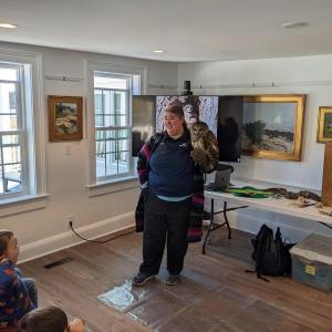 Colleen Moureaux presents a Barred Owl to the delighted attendees at BRLT’s Oak Point Farm. Courtesy of BRLT