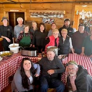 N A Reny Construction workers and Brady’s staff at the Community Lunch March 6. Courtesy photo