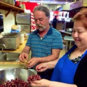 Mark and Giannoula Rigas work together in the kitchen at the House of Pizza in Boothbay Harbor which they started 30 years ago. Courtesy of Konstantina Rigas