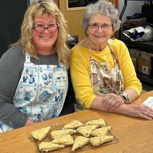 Kimberly, left, and Doris Burnham of Trevett show off their scones at the March 14 baking class with Deb Arter. Courtesy of BRAE