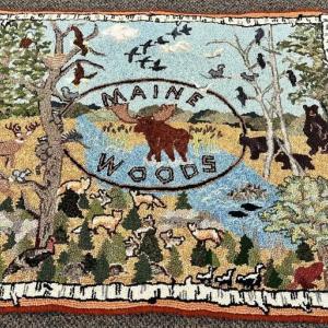 This outdoorsy-themed rug hooking is by Joan Dow, just one of the 23 Midcoast Fiber Artists in the May-June show at Southport Memorial Library. Courtesy of the artist Joan Dow