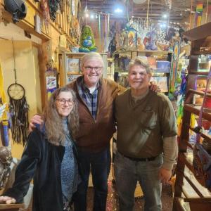 New Enchantments owners Linda and Joey Marciniak join retiring owner Bill Kirby, center. Courtesy photo