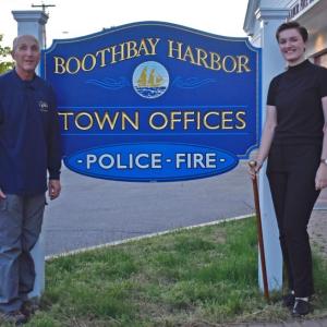 Larry Brown and Grace Campbell, who holds the commemorative Boston Post Cane given to her by the town of Boothbay Harbor for her research on the town’s Boston Post Cane recipients. FRITZ FREUDENBERGER/Boothbay Register
