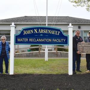 Members of the Arsenault family gather with Sewer District Superintendent Chris Higgins to honor the late John Arsenault at the newly dedicated water treatment facility. From left, Billy Arsenault, Laura Arsenault, Gary Arsenault, Ron Arsenault and Higgins. FRITZ FREUDENBERGER/Boothbay Register