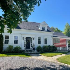 This 1840 Greek Cape Revival in Boothbay Harbor is part of the Boothbay Region Garden Club’s 2023 Home and Garden Tour. Courtesy photo