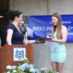 Assistant Principal Julianne Hansbury presents the Secretary of State Eighth Grade Citizenship Award to Sophia Mansfield during the BRES Eighth Grade Recognition Night June 20. FRITZ FREUDENBERGER/Boothbay Register