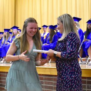 Madeline Andreason receives a donor book award from Leanne Burnham during the annual BRHS Donor Book Awards June 7. FRITZ FREUDENBERGER/Boothbay Register