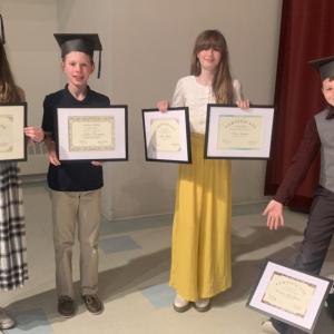 These Edgecomb Eddy School sixth grade graduates were honored with achievement awards during the June 22 graduation. Pictured, from left, are Stella Chapman, Academics; John Cooper, Sara Leone Citizenship; Olive Tomko, Academics and Art, Carson MacKusick, Music. BILL PEARSON/Boothbay Register