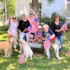 Pictured preparing for July 4 and working on the upcoming Labor Day Bands for Books to raise funds for Wiscasset Public Library are Linda Winterberg, Hannah Stewart, Kate Curran, Linda Adams, Lynn Maloney and Tracey Whitney. Canine supporters are Sandy, Stella, Cooper, Luna, Quincy and Bradley. Courtesy of Linda Adams