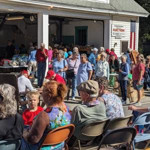 Over 100 registered bidders help push Southport Fireman’s Auction to record success. CANDI JONETH/Boothbay Register