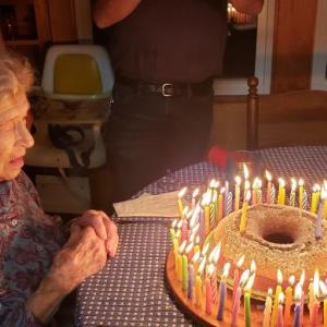 Edna Stoddard gets ready to blow out the candles on her birthday cake. Courtesy of Linda Harper