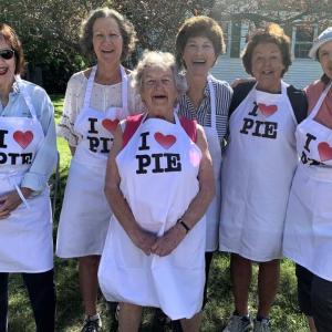 Freda Burnham, front, is all smiles Aug. 12 as she and her fellow East Boothbay United Methodist Church Women prepare to sell pies and baked goods. Also pictured, back, from left, Gay Chatham, Mary Jo Hamman, Anne Burt, Sara Kerr and Deb Moorefield. BILL PEARSON/Boothbay Register