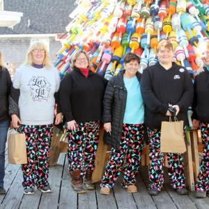 Early Birds gathered ‘round the holiday Pot Buoy Tree on Pier 1 last year. There will be more this year on Saturday, Nov. 18 - maybe even you! File photo