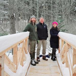 Key YMCA Camp K Bridge to Trail project partners, from left: John Copeland, owner of Kennebec Trail Company, Andy Hamblett, CEO of the BRYMCA, and Sue Mello, Natural Resources Program Manager for the BRWD. Courtesy of Rose Mooney