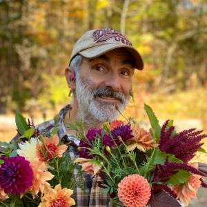 Alain Ollier, Veggies to Table co-founder, and dahlias. Courtesy photo