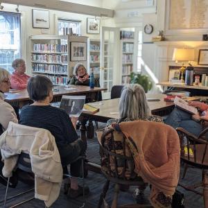 Larissa Picard of Maine Humanities Council facilitates a discussion of “We” by Yevgeny Zamyatin, et al. The discussion highlighted the parallels between the book’s dystopia and modern day Russia and North Korea. CANDI JONETH/Boothbay Register