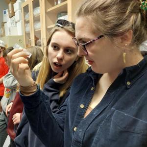 Mariah J. and Hannah J. observe ticks during the 2023 Ag Symposium visit to the UMaine Extension Tick Lab. Courtesy University of Maine Cooperative Extension.