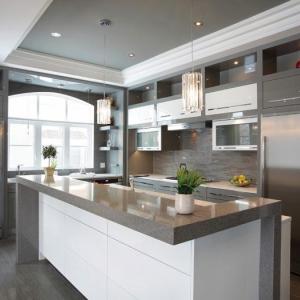Modern kitchens tend to feature efficient, top-tier appliances with additional storage and space amenities that keep the room from feeling cluttered.
