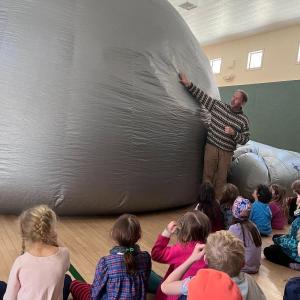 John Meader of of Northern Stars Planetarium recreates the night sky for CTL students in a giant inflatable dome. Courtesy of CTL