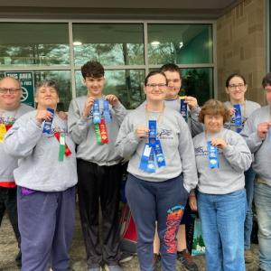 Members of the Boothbay Special Olympic team hold the ribbons they won April 11. Courtesy of Toby LeConte