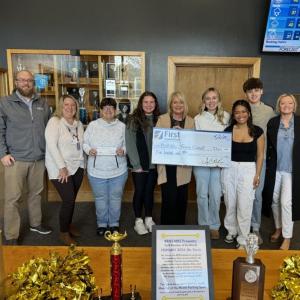 Pictured from left are: Adam Climo of First National Bank, Aminda LaBrecque of the BRHS Health Center, Christina Lorrain of BRHS, senior Meg Sledge, BRHS Principal Dr. Tricia Campbell, senior Charlotte Fuchswanz, senior Ariel Alamo, BRHS student body president Colby Allen and Alyssa Allen of First National Bank. Courtesy photo