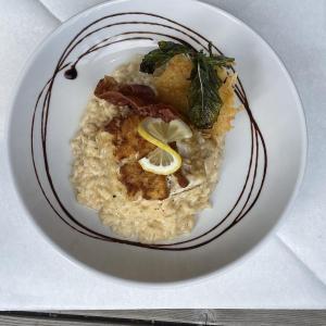 Boat House Bistro’s cheese risotto with pan-seared haddock. Courtesy photo
