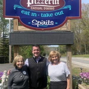 U.S. Congressional candidate Andrew Piantidosi stops in Edgecomb May 17 with Dawn Gilbert, left, and met Ann LePage, right, at Cook’s Landing during a campaign stop. BILL PEARSON/Boothbay Register