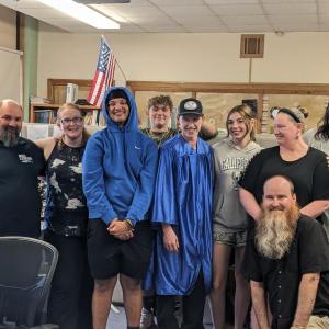 Loved ones gather to congratulate Andrew Gudroe. CANDI JONETH/Boothbay Register