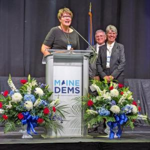 Maine Democratic Party Chair Bev Uhlenake presents the John Walker Award to Christopher and Valarie Johnson of Somerville during the Maine Democratic State Convention on June 1 at the Cross Insurance Center in Bangor. Courtesy photo