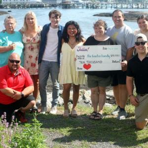 Julia Gagnon with members of the Crocker family at the benefit show at Brady’s restaurant on July 17. STEVE EDWARDS/Boothbay Register