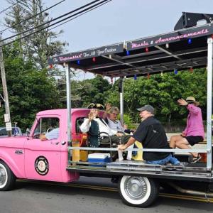 Olde Bristol Days Parade grand marshals Pat and Bill Benner of Bristol, with their children Kevin and Rachel, were honored at Saturday's parade as they cruised in the "Gupcaster." Hope Prentice photo