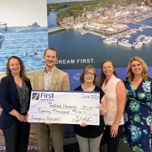 Pictured from left are First National Bank’s Kimberly Averill, Tedford Housing’s Andrew Lardie, First National Bank’s Susan Norton, Jessica Day and Nicci Kimball. Courtesy of FNB