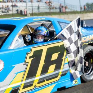 Kevin Douglass celebrates another victory in the Norm's Used Cars Pro Stocks. Jasen Dickey Photography