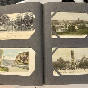 MacQueen's postcard album, filled with personal mementos and greetings from friends. ISABELLE CURTIS/Boothbay Register ISABELLE CURTIS/Boothbay Register