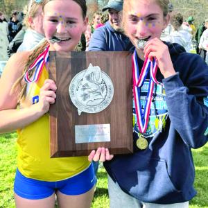 Two runners celebrate. 