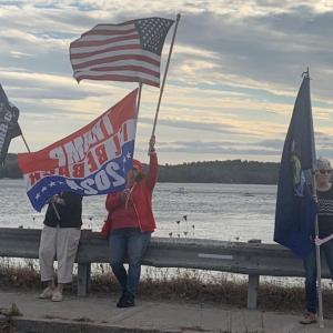 Happy Trump supporters march to celebrate the presidential election results on Donald E. Davey Bridge in Wiscasset Nov. 6. BILL PEARSON/Boothbay Register Flag celebration