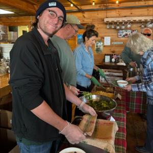 Cody Mitchell of Boothbay Craft Brewery, along with his parents Win and Lori, serve up lunch on Nov. 18. Jen Mitchell photo Community Lunch Nov 18