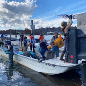 Clean-up volunteers unload trash collected from along the shoreline of the Damariscotta River on Nov. 1. Courtesy of Coastal Rivers
