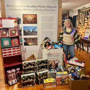 Jen Field celebrating the success of the final night of donations at Bristol Marine's toy drive. Courtesy Dennis Gunderson Jen Field celebrating the success of the final night of donations at Bristol Marine's toy drive. Courtesy Dennis Gunderson