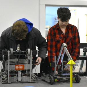 Thomas Babineau, left, and Anthony Angelico make adjustments. ISABELLE CURTIS/Boothbay Register