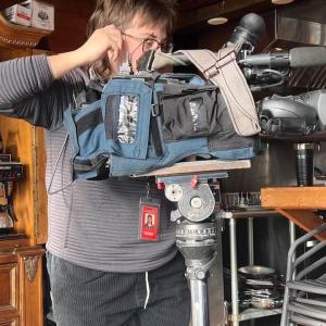 Videographer for "207," Scout sets up a camera. Jen Mitchell photo