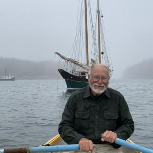 Fred Bowers rowing to his boat. Courtesy of Fred Bowers